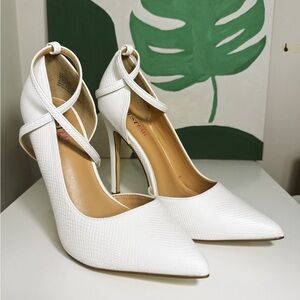 Brand new white heeled shoes